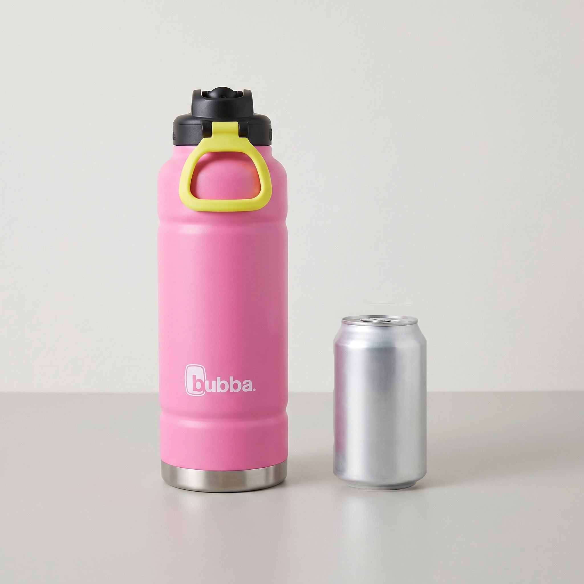 bubba 40 oz Trailblazer insulated bottle in Azalea with straw lid standing beside a 355 ml can for size comparison. It stands 11.22 in tall.
