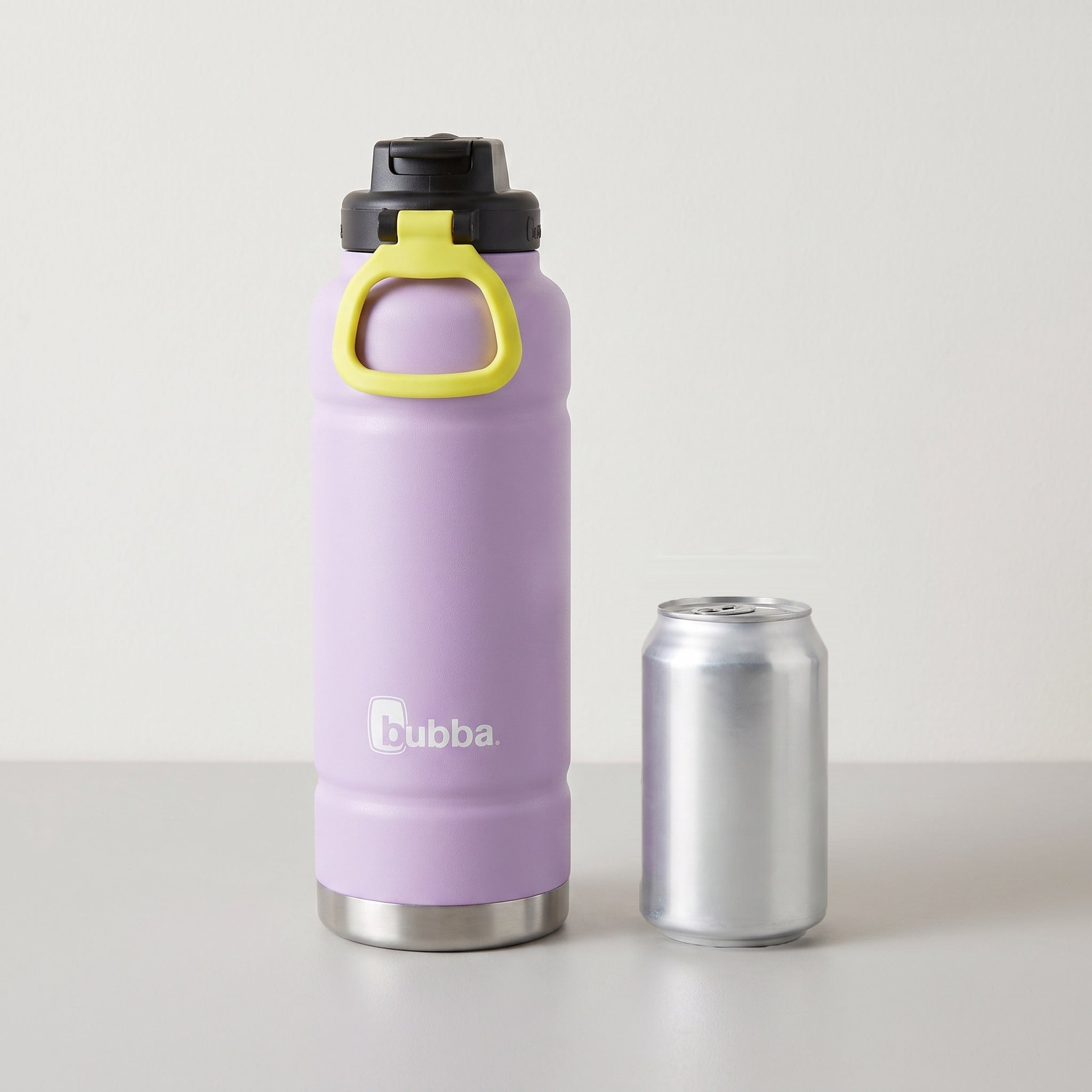 bubba 40 oz Trailblazer insulated bottle in Lavender Frost with straw lid standing beside a 355 ml can for size comparison. It stands 11.22 in tall.