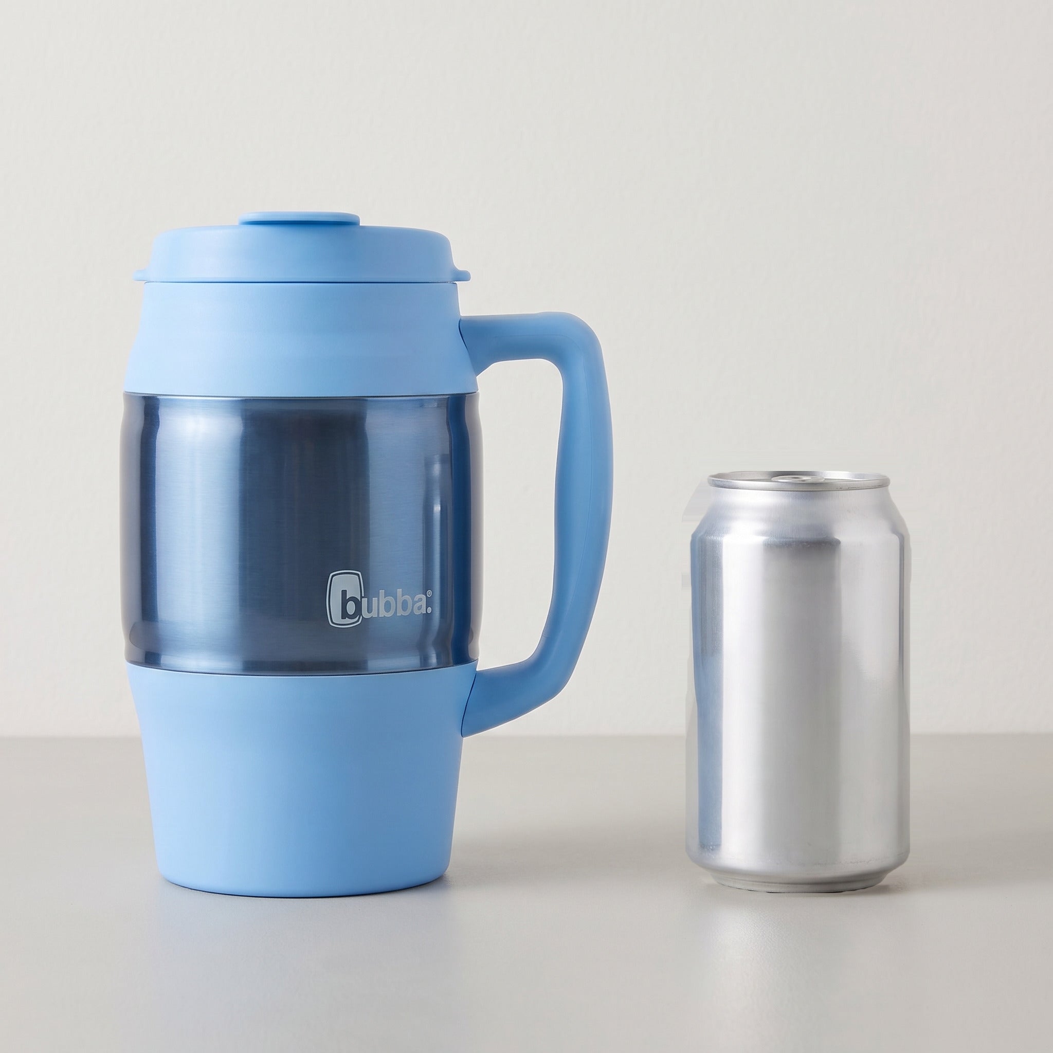 bubba 34 oz Classic Mug in Daydream standing beside a 355 ml can for size comparison. It stands 7.88 in tall.