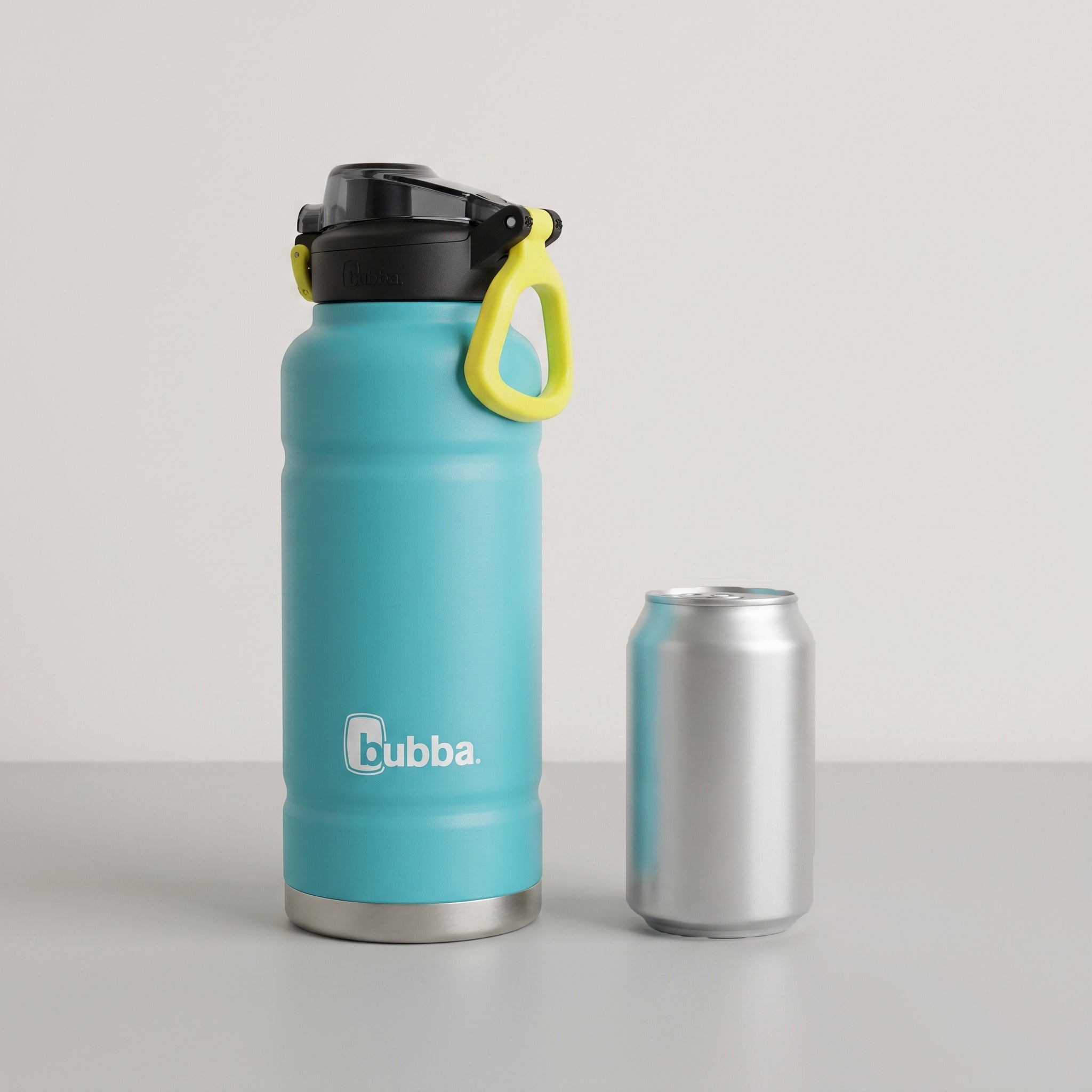 bubba 40 oz Trailblazer insulated bottle in Scuba standing beside a 355 ml can for size comparison. It stands 11.22 in tall.