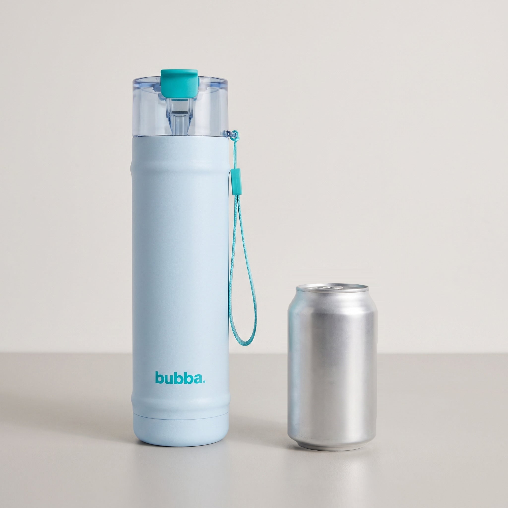 bubba 24 oz DualSip insulated bottle in Daydreamin' standing beside a 355 ml can for size comparison. It stands 10.79 in tall.