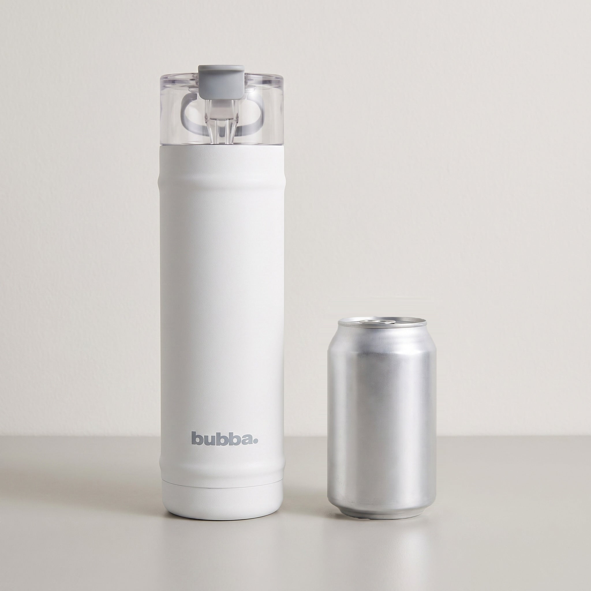 bubba 24 oz DualSip insulated bottle in Fresh Kicks standing beside a 355 ml can for size comparison. It stands 10.79 in tall.