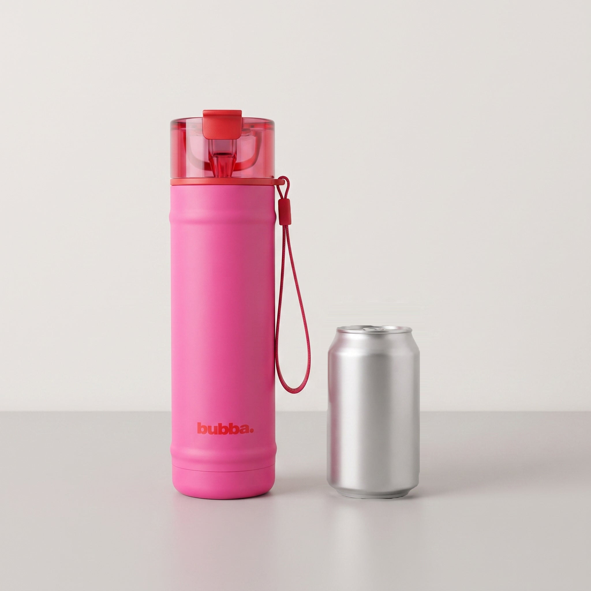 bubba 24 oz DualSip insulated bottle in Flora Aura standing beside a 355 ml can for size comparison. It stands 10.79 in tall.