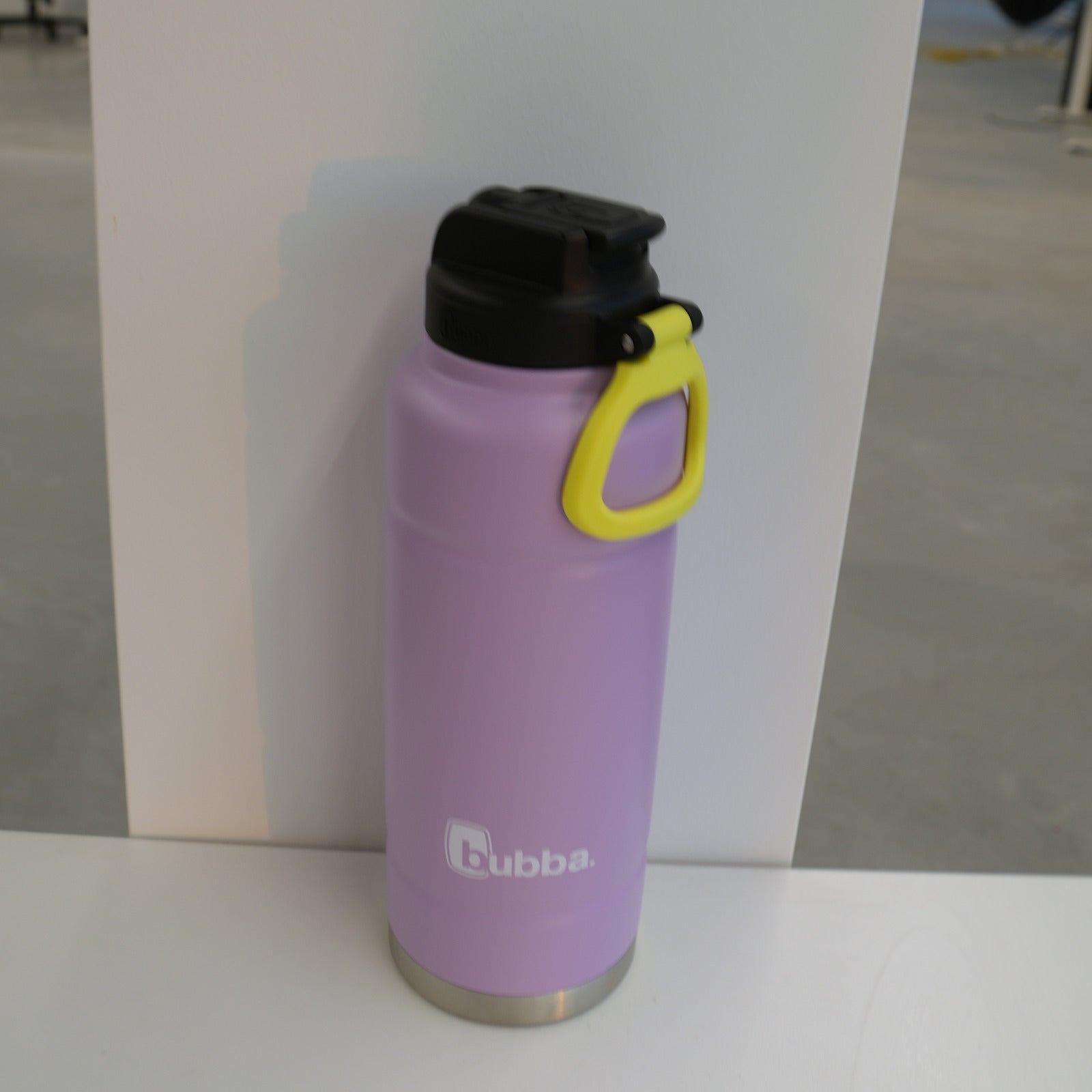 bubba 40 oz Trailblazer insulated bottle in Lavender Frost, upright with the lid closed and the yellow carry loop attached